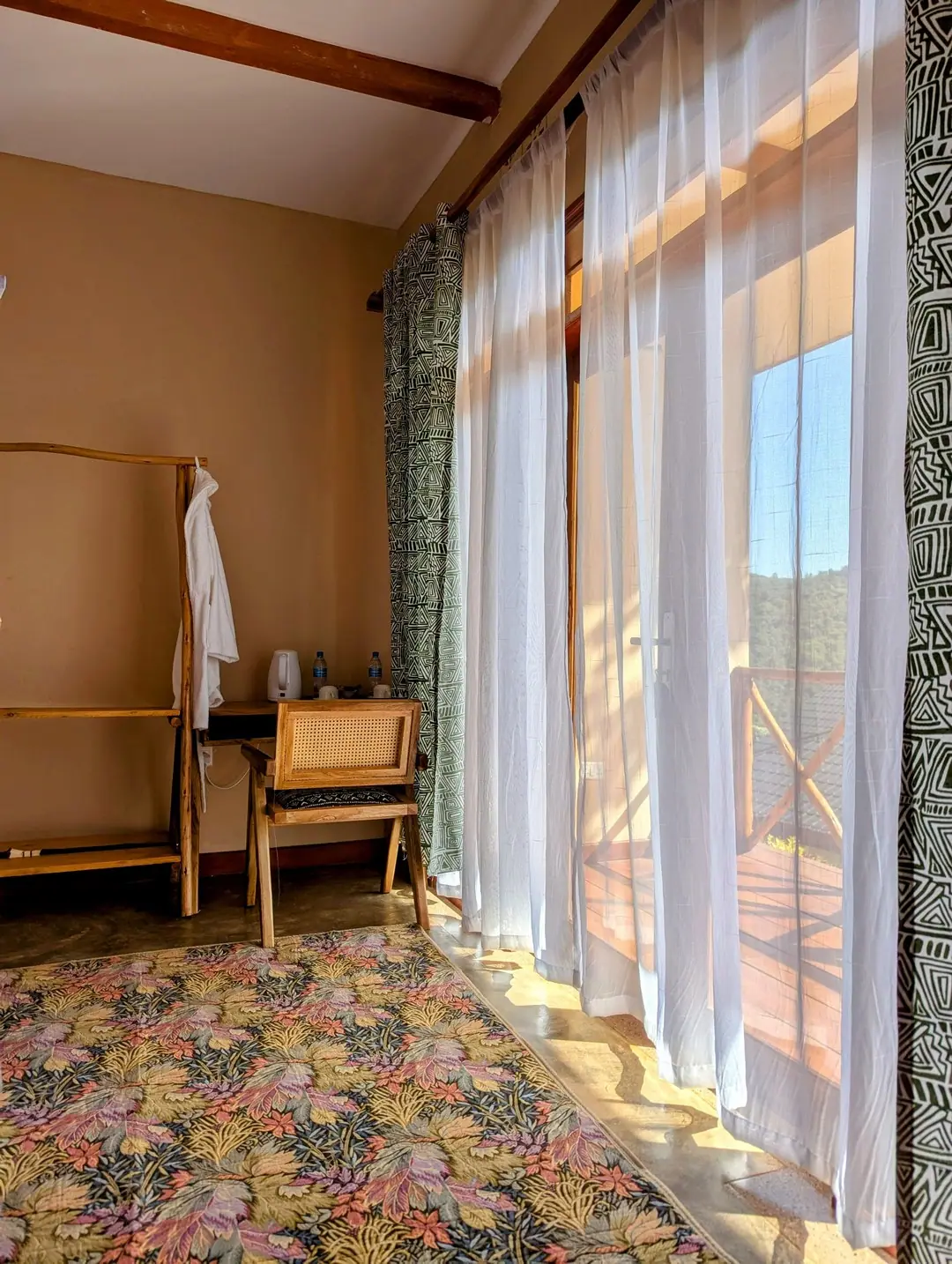 Room with floor-length curtains, Mvuli Mountain Lodge