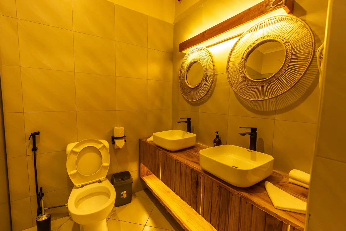 Bathroom vanity and toiletries at Mvuli Farm Lodge