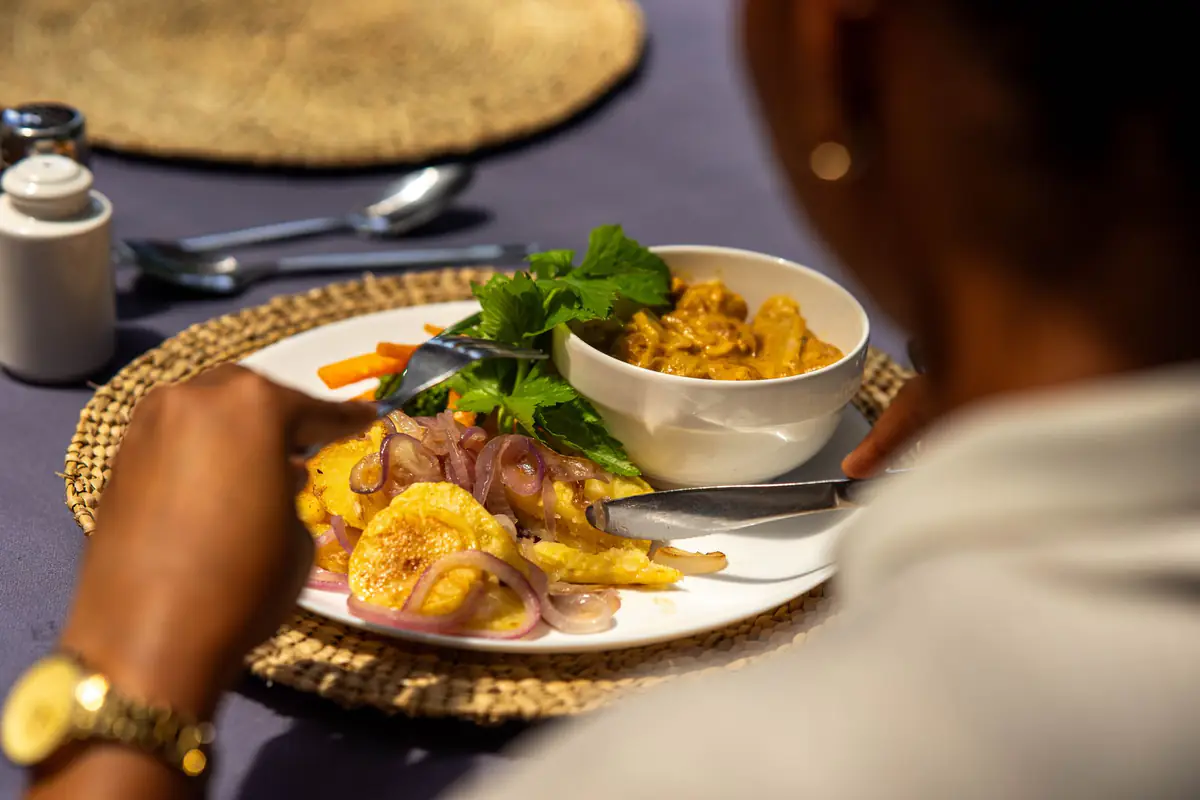 Curry, plantain and salad at Mvuli Farm Lodge