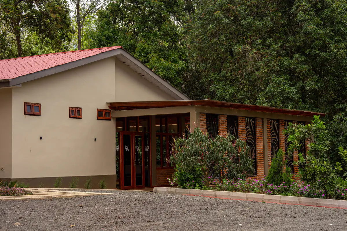Restaurant pavilion among the gardens at Mvuli Farm Lodge