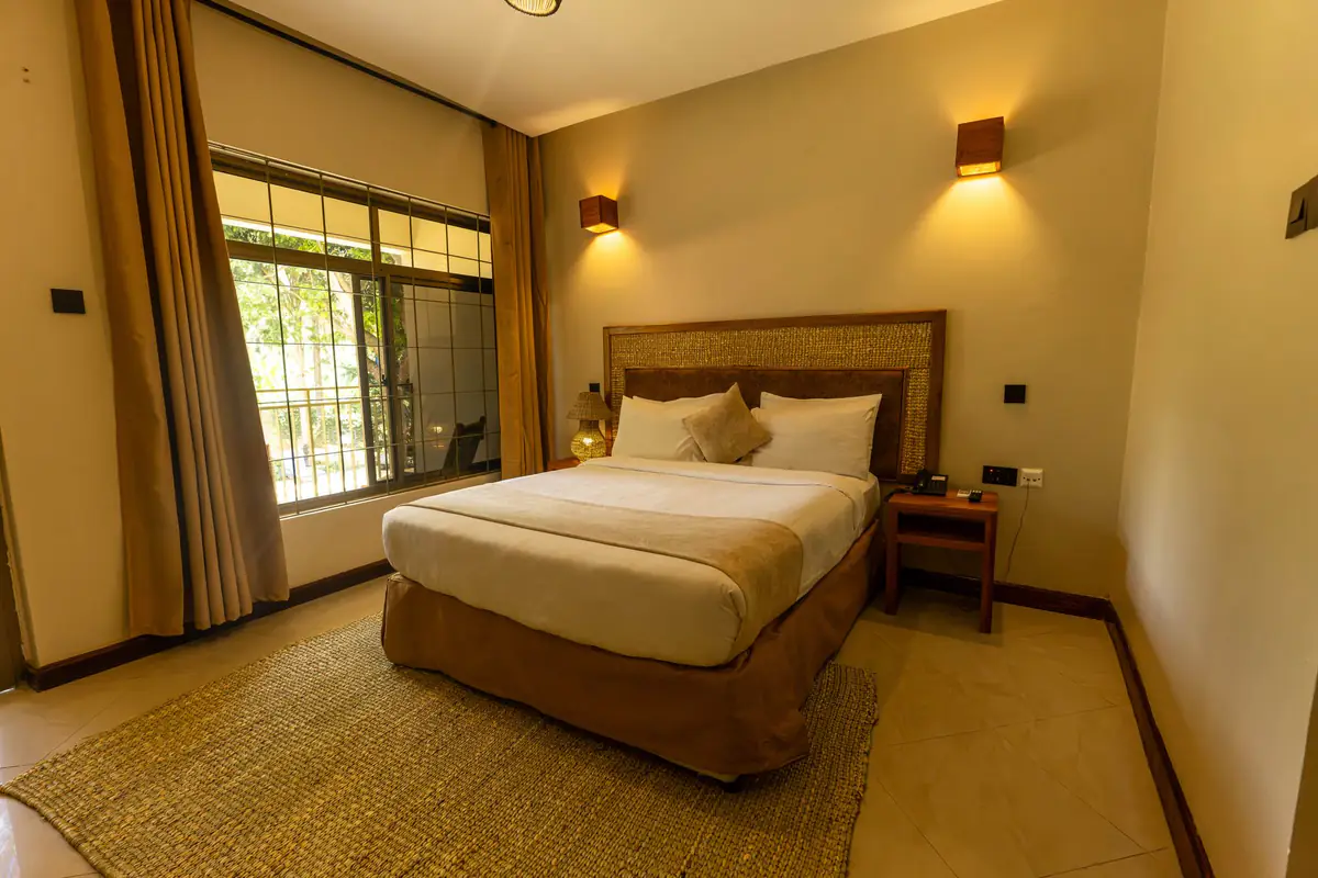 Bright room with garden window at Mvuli Farm Lodge
